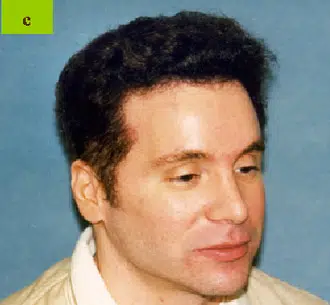 Profile image of a man with dark, wavy hair and a fair complexion, facing slightly to the right. The background is a soft blue, providing contrast to the subject. The image captures a thoughtful expression, highlighting the contours of his face. This image could be used in contexts related to discussions about identity, psychology, or criminal justice.